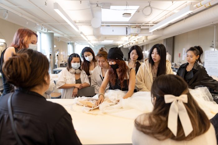 Otis students upcycling a wedding dress