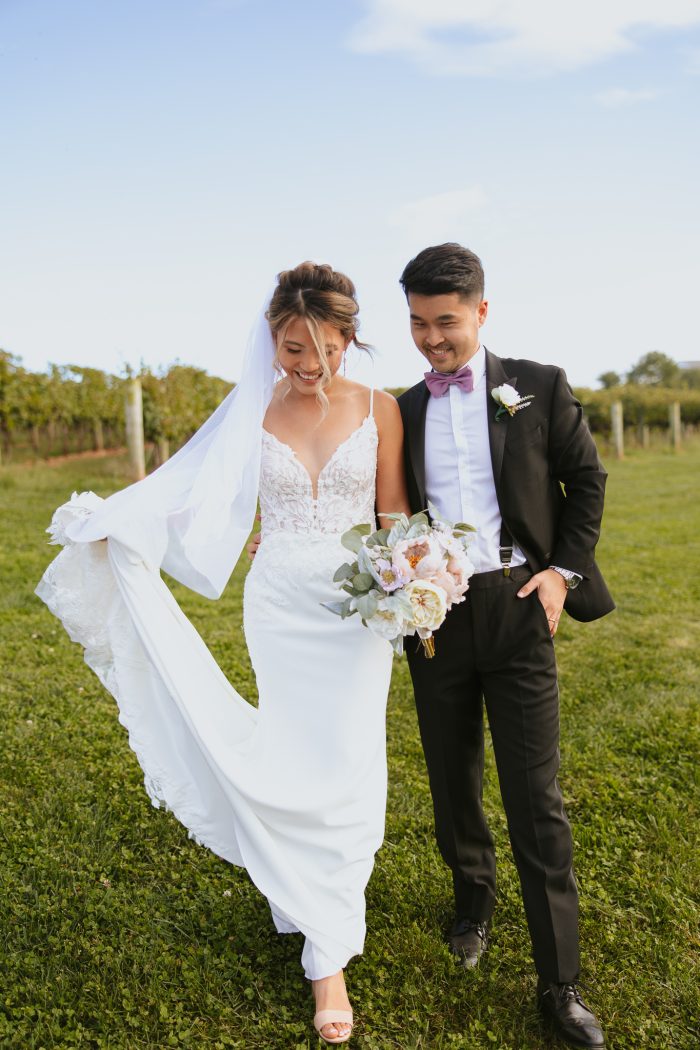 Bride wearing Alda wedding dress by Rebecca Ingram