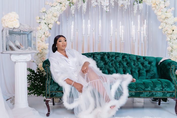 Curvy Model Wearing Slip Before Putting on Wedding Dress