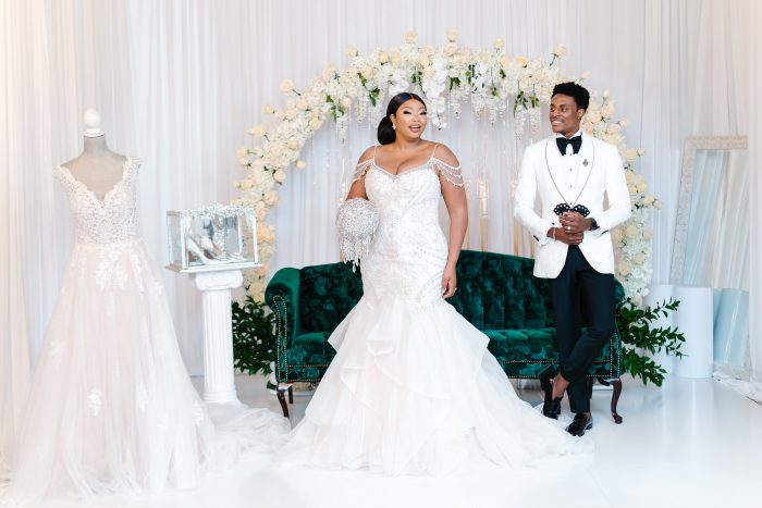 Groom Wearing White with Bride Wearing a Mermaid Wedding Dress by Maggie Sottero at an Elysian Wedding