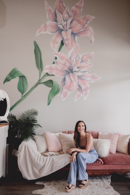 Roselily Bridal Owner Sitting On The Couch