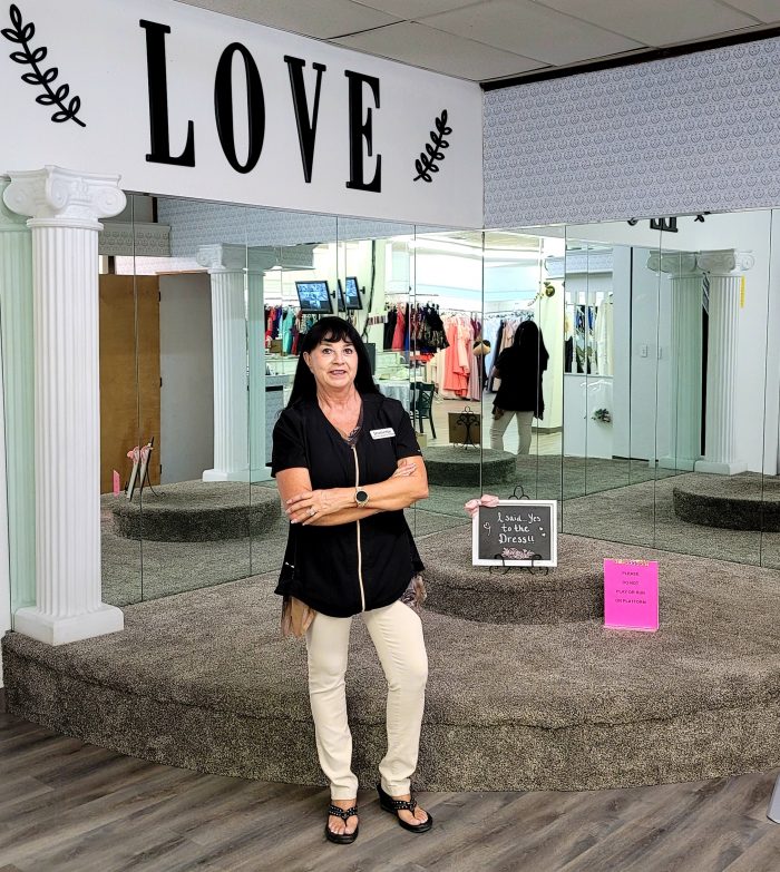 Jae-Geos Bridal and Tuxedo Owner In Her Boutique