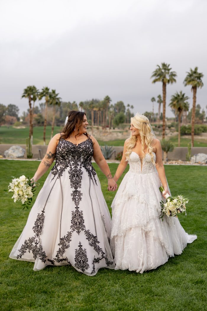 Brides Katie and Curly, wearing Tristyn wedding gown by Maggie Sottero, at their New Year's Eve wedding