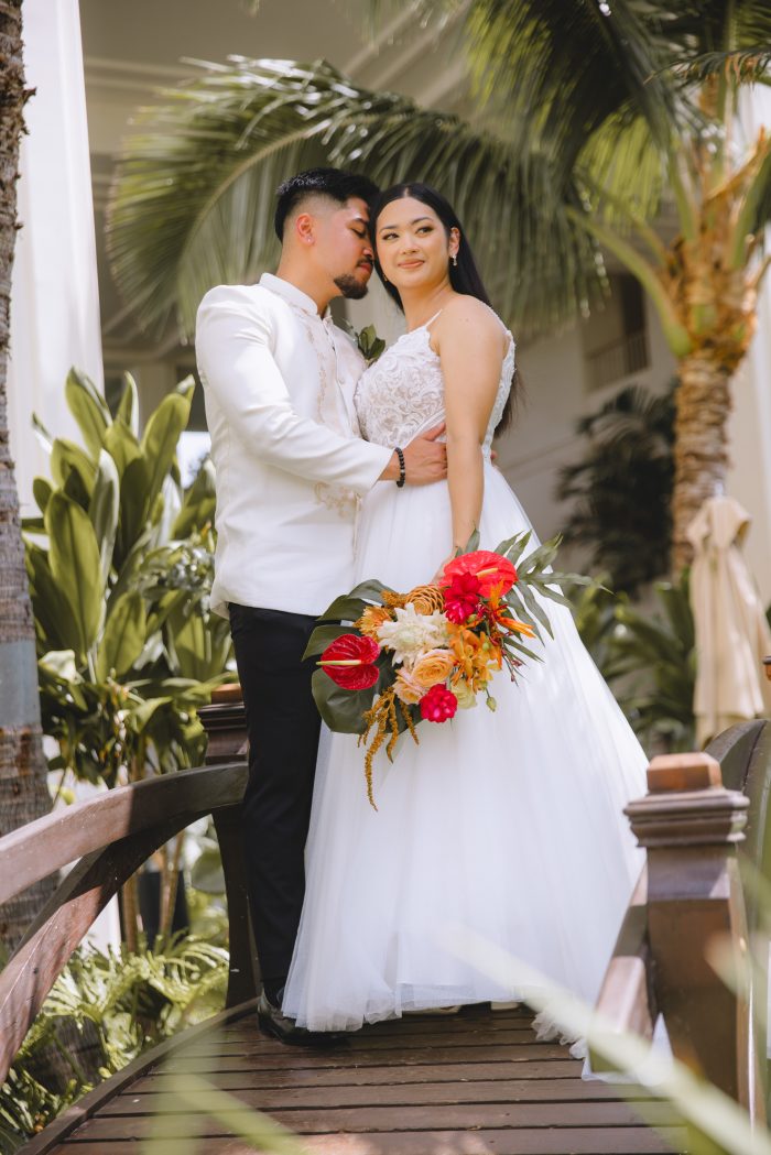 Kaye wearing Lorraine Lane Marie by Rebecca Ingram at her Hawaii nuptials