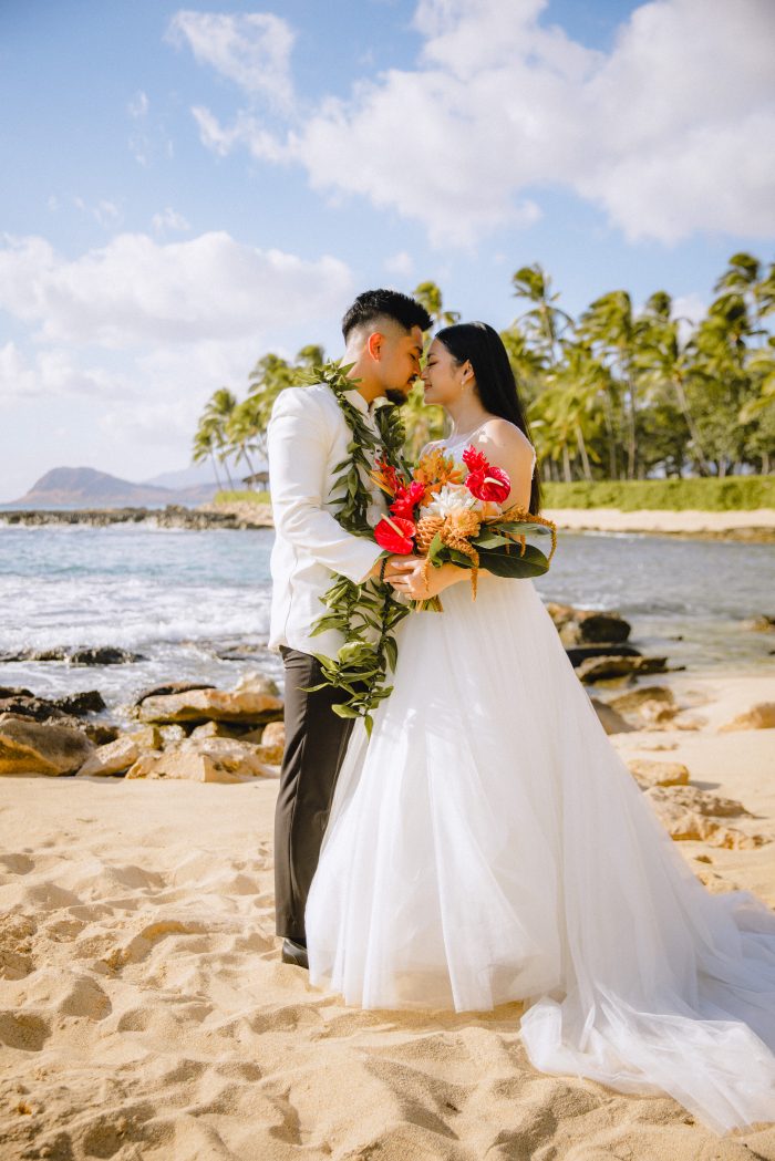Kaye wearing Lorraine Lane Marie by Rebecca Ingram at her Hawaii nuptials