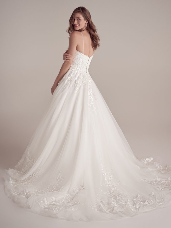 Bride wearing Casey by Maggie Sottero at a bridal boutique