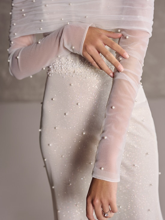 Bride wearing Drew Marie Detachable Jacket as a wedding dress customization