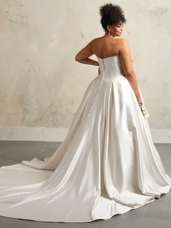 Bride wearing one of our Maggie Sottero wedding dresses called Fortune by Maggie Sottero