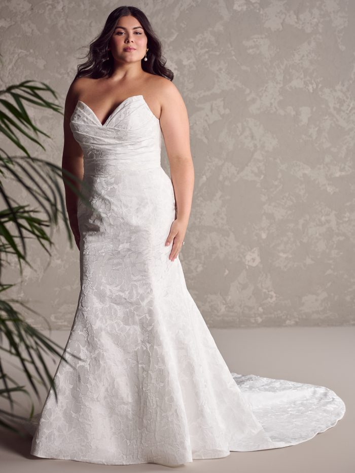 Bride wearing Hilo brocade wedding dress by Maggie Sottero