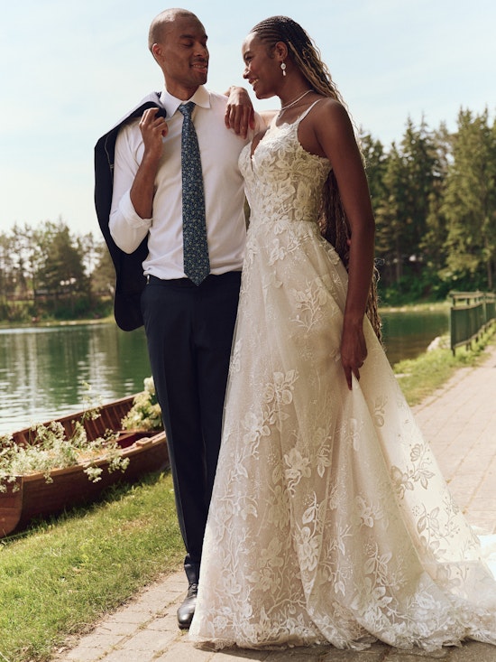 Bride wearing pearl wedding dress called Jerrica by Maggie Sottero