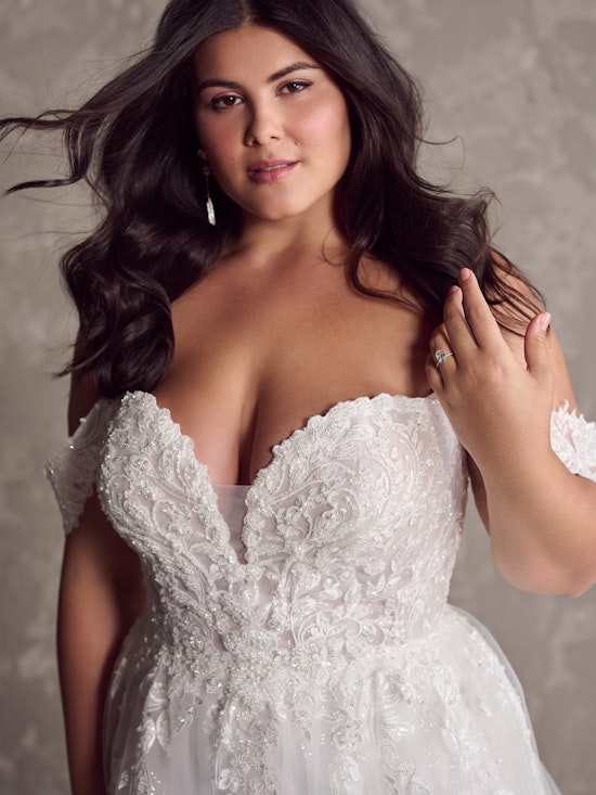 Bride wearing Marguerite colorful wedding dress by Maggie Sottero