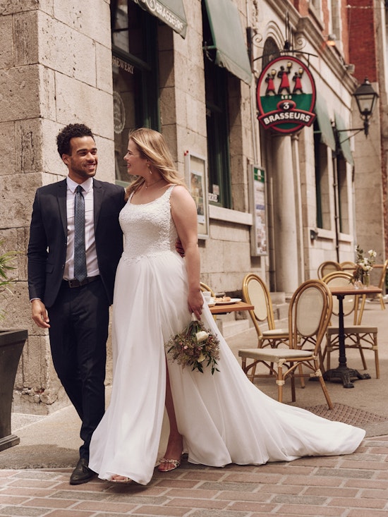 Bride wearing drop waist wedding dress Cory by Rebecca Ingram