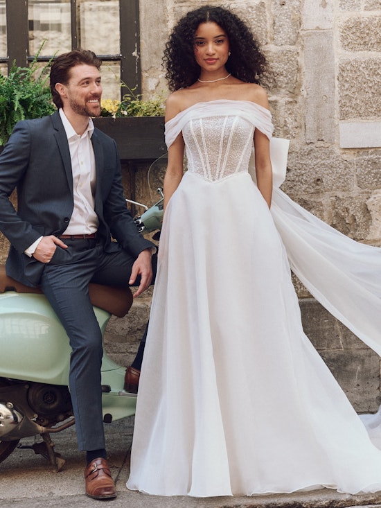 Bride wearing drop waist wedding dress Krisha by Rebecca Ingram