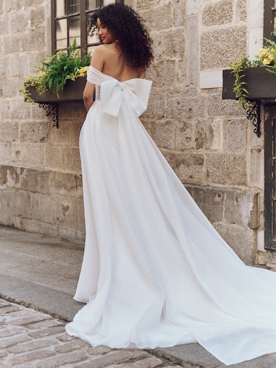 Bride wearing drop waist wedding dress Krisha by Rebecca Ingram