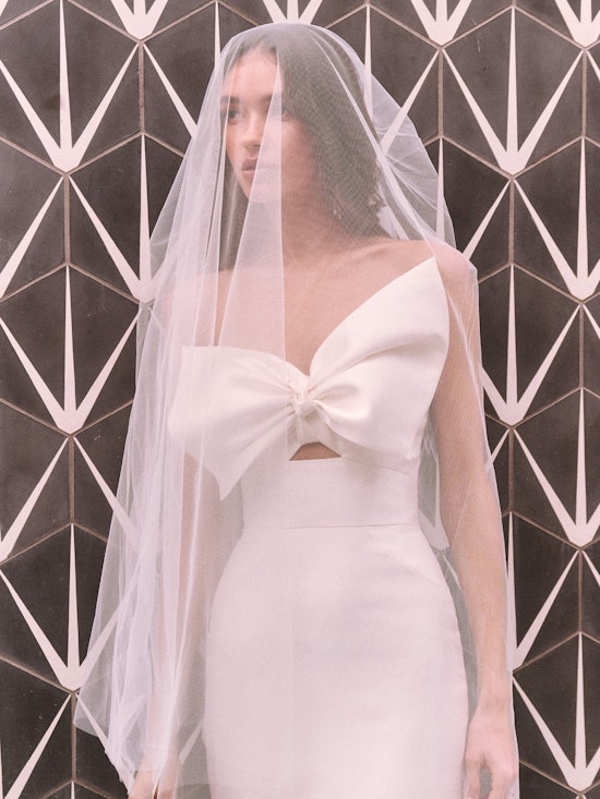 Bride wearing Pezy by Rebecca Ingram