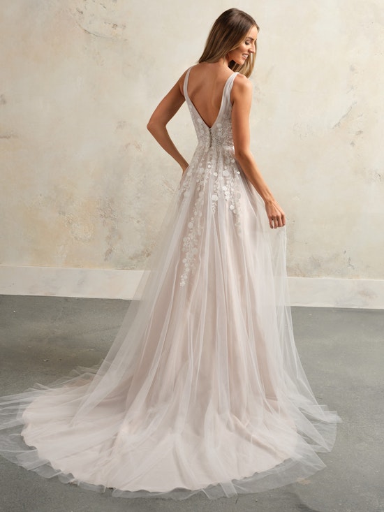 Bride wearing Zinnia by Rebecca Ingram