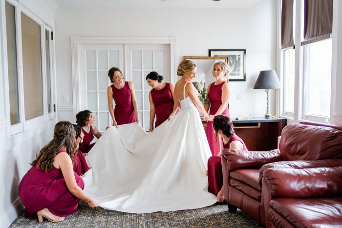 Bride wearing Selena wedding gown by Maggie Sottero, which works wonderfully for winter wedding themes