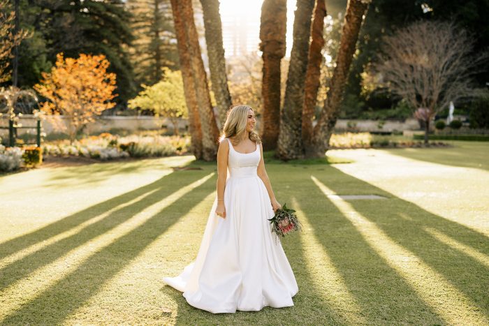 Bride wearing Selena bridal gown by Maggie Sottero