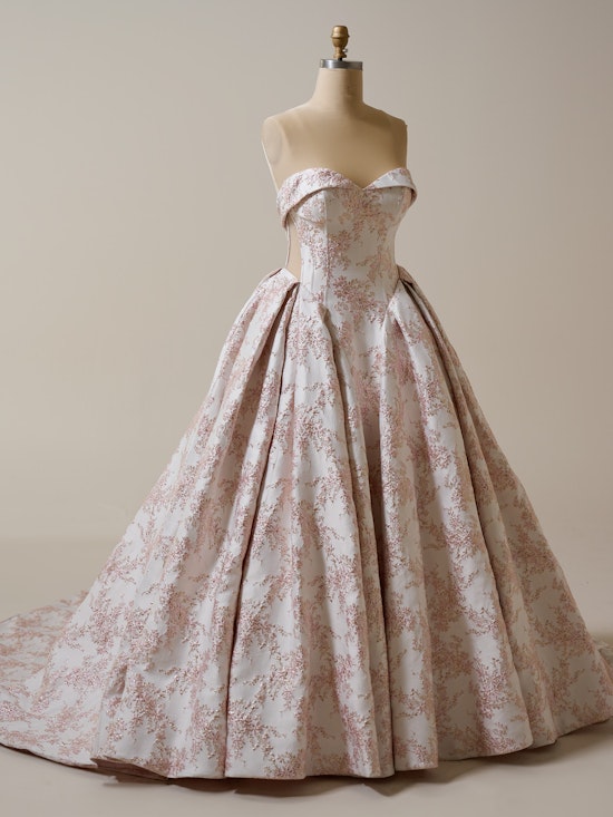 Pink floral ballgown wedding dress on a mannequin 
