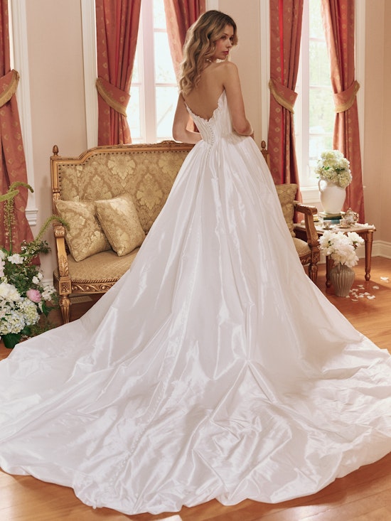 Bride wearing drop waist wedding dress Lafayette by Sottero and Midgley