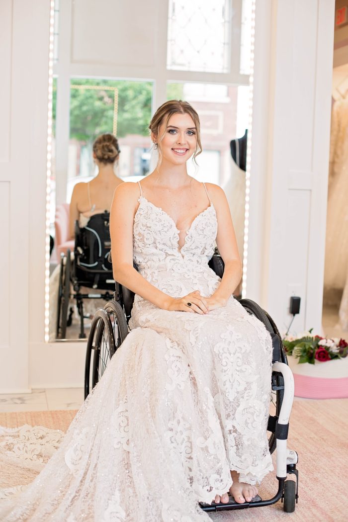 Bride trying on a Maggie Sottero gown