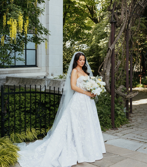Annie Clark wearing her celebrity wedding dress