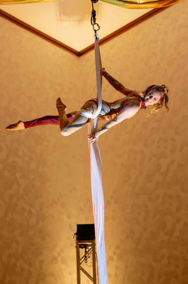 Aerialist performing at Katie and Curly's New Year's Eve wedding