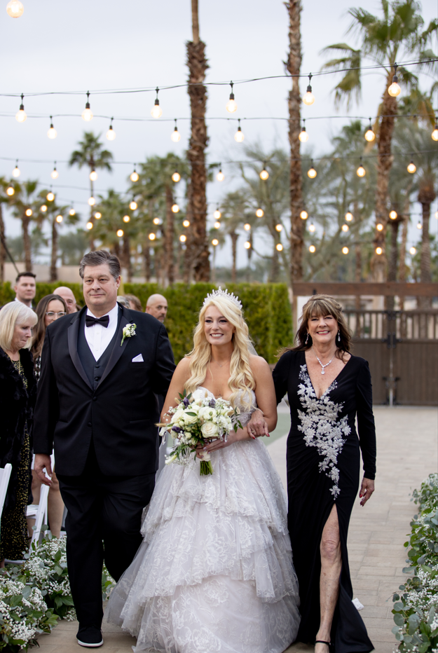 Katie walking down the aisle at her New Year's Eve wedding