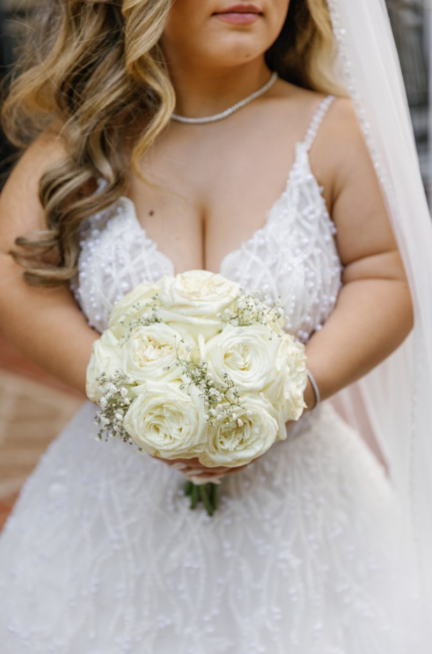 Lona wearing one of Sottero and Midgley's A-line wedding dresses, Marvine