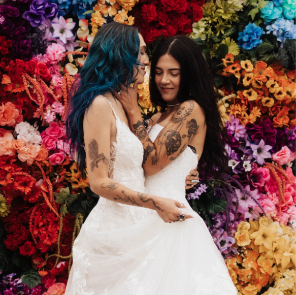 Photo of brides embracing