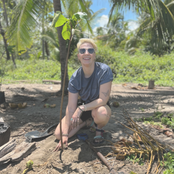 Team member volunteering with One Tree Planted
